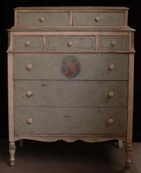 Moss green and peach country-style cabinet-top dresser; 1920s.